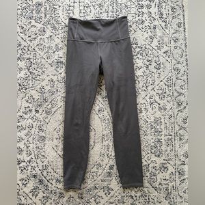 Athleta laser cut 7/8 tights in brown size xs